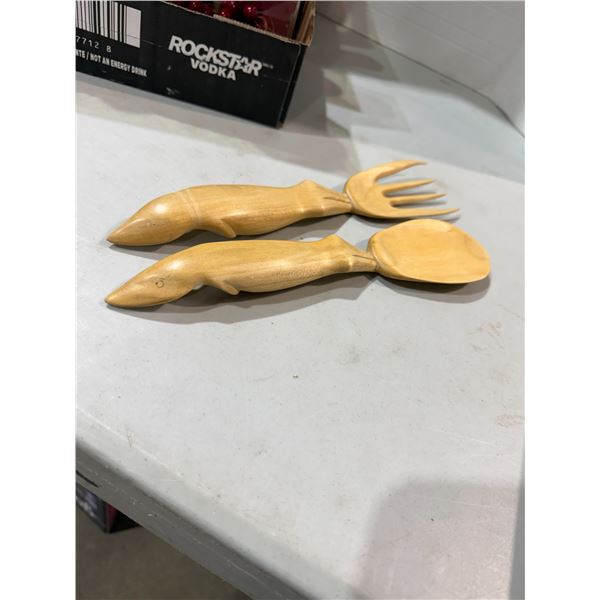 Fish shaped salad, forks, cutting board