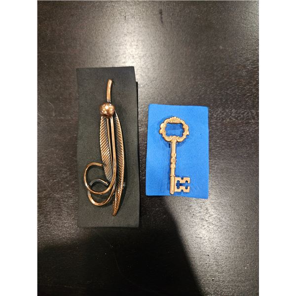 Feather & Key brooches