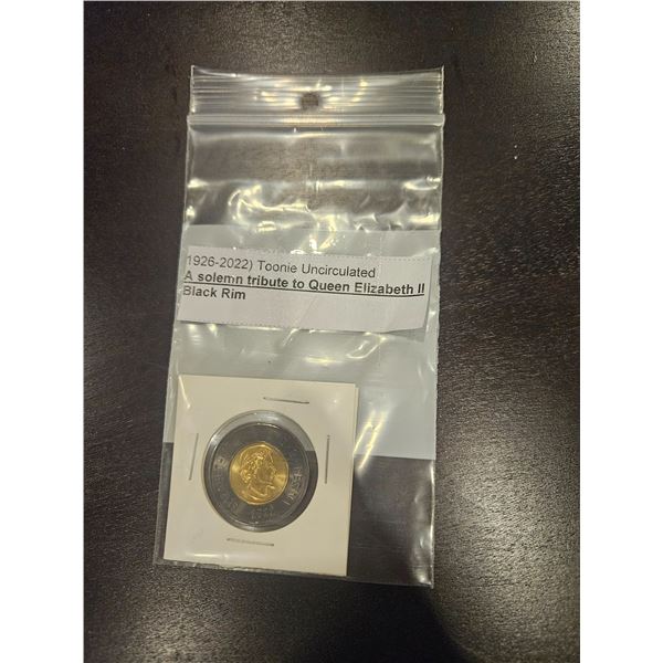 1926-2022 Canada "solemn tribute" black rim loonie
