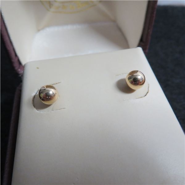 14K Yellow gold stud earrings.  Timeless!  Marked 14K on post