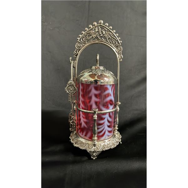 METAL AND CRANBERRY MILK GLASS PICKLE CASTOR: 10.5"T