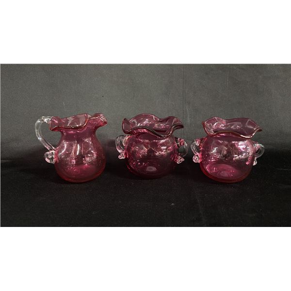 (2) CRANBERRY GLASS BUD VASES & (1) CRANBERRY GLASS PITCHER 5" WIDE
