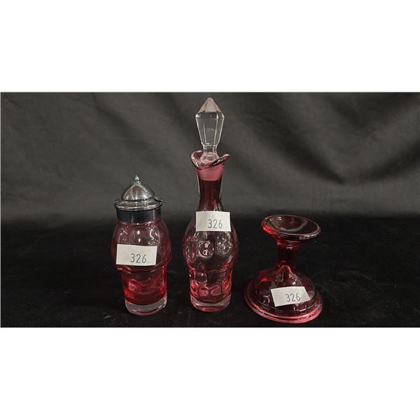 CRANBERRY GLASS CANDLESTICK & (2) CRANBERRY GLASS CRUETS: TALLEST IS 8"