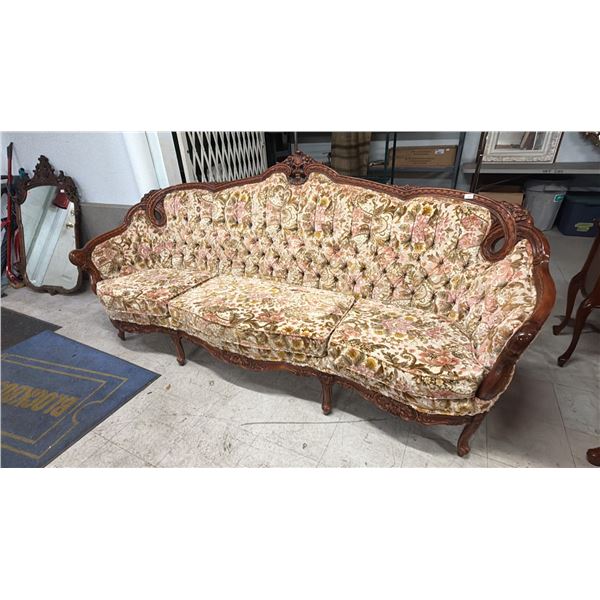 FRENCH PROVINCIAL 3-SEATED HEAVILY CARVED BUTTON BACK FLORAL SOFA