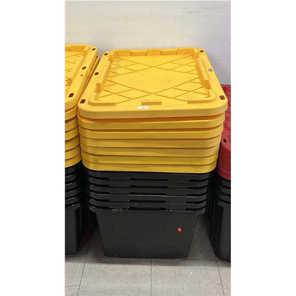 STACK OF (7) LARGE BLACK TOTES WITH YELLOW LIDS