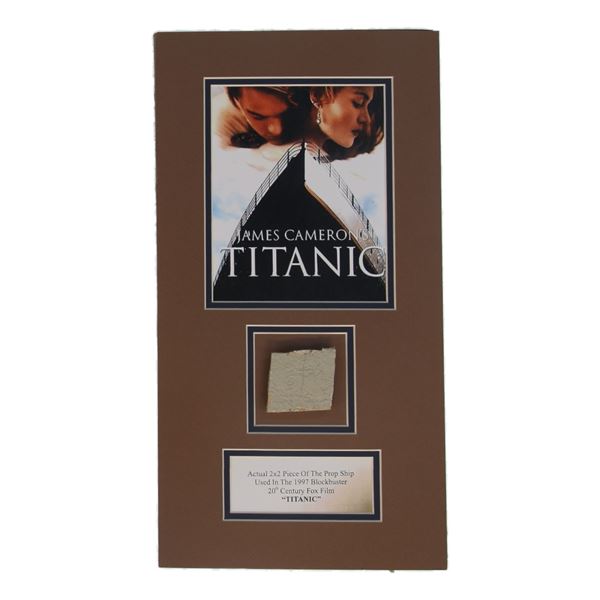 TITANIC MOVIE PRESENTATION PIECE INCLUDING 2X2 PIECE OF THE PROP SHIP USED IN THE MOVIE - COA