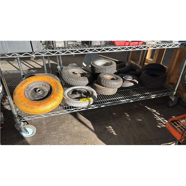 SHELF OF ASSORTED WHEELS FOR UTILITY EQUIPMENT