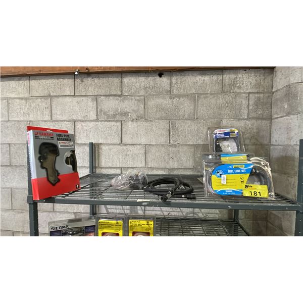 SHELF OF ASSORTED ITEMS INCLUDING; YAMAHA FUEL PIPE ASSEMBLY, BEACHOICE FUEL LINE KITS & MORE