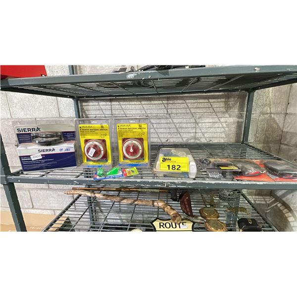 SHELF OF ASSORTED ITEMS INCLUDING; SIERRA FUEL/WATER SEPARATING FILTER, BLUE SEA SYSTEMS C-SERIES