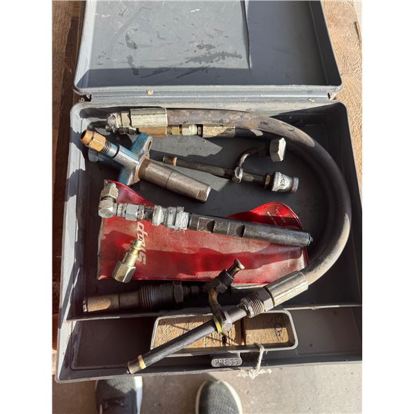 Snap on and otherhydraulic pressure testing kit, possibly for a fuel system or pressure washer.