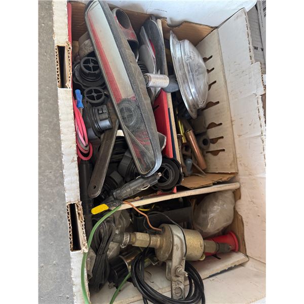 assorted used automotive parts, likely from a salvage operation.