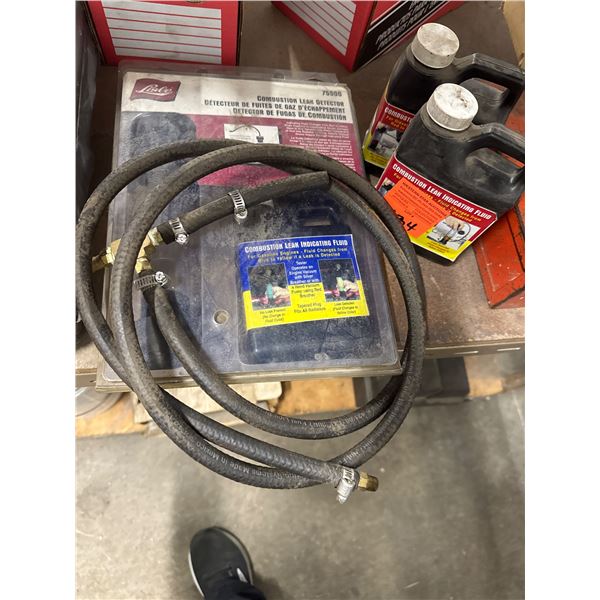 Combustion leak indicating fluid