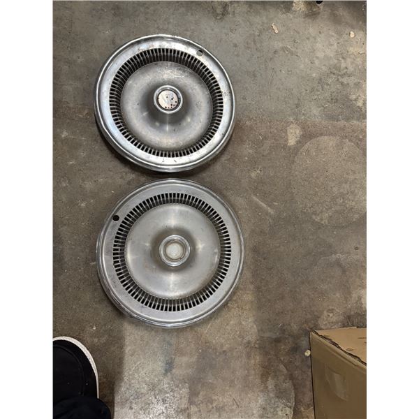 Buick 14-inch aluminum hubcaps, specifically designed for models from the 1970s.