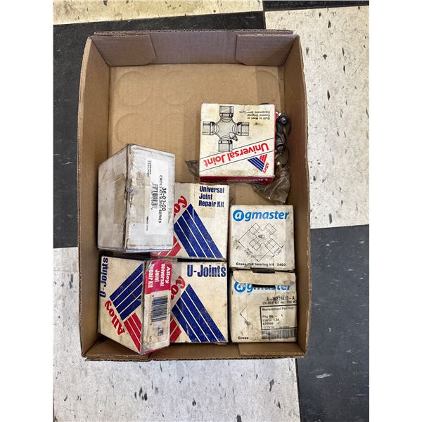 Universal joint repair kits and universal joints