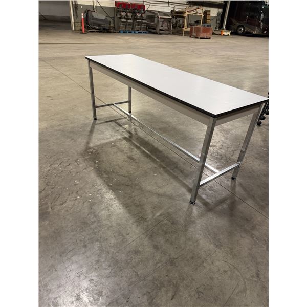 Table measures  72" x 24" x 29" tall