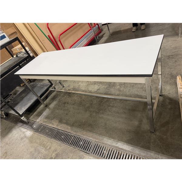 Table measures  72" x 24" x 29" tall