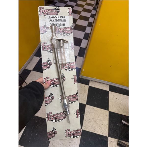 High-tech trans dipstick for L60E trans mount
