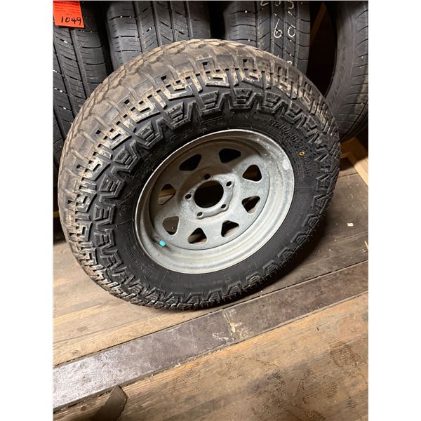 Tire and rim 215/75R 14
