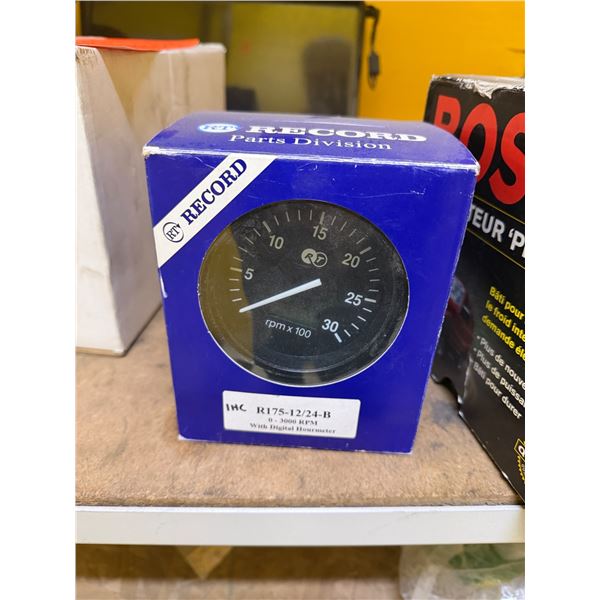 Tachometer with digital hour meter