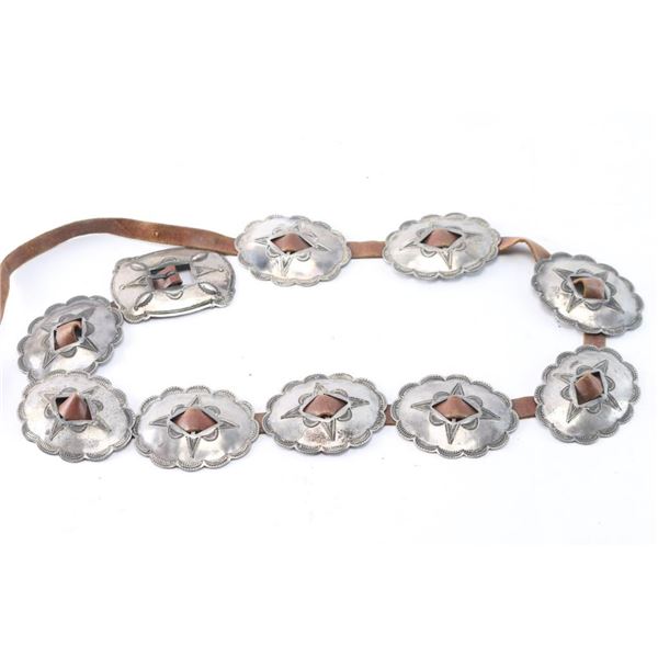 Silver Stamped Concho Belt.