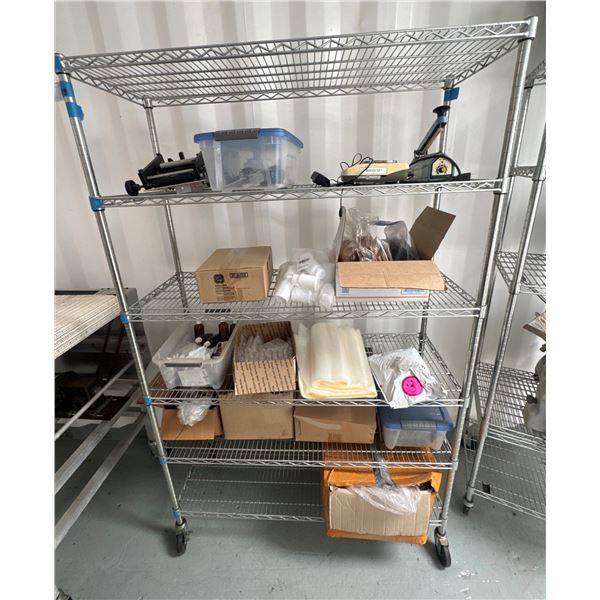 Rolling Metal Shelf & Contents: Misc Prototype Packaging, Unopened Boxes, Small Equipment