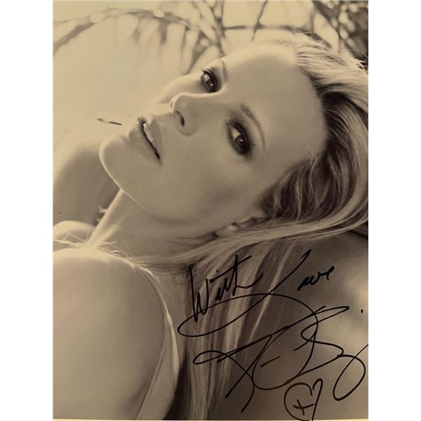 Kim Basinger facsimile signed photo. 8x10 inches