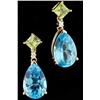 Image 1 : Marvelous 14K YG Ladies Custom Earrings set with 2 matching pear shape sky blue topaz weighing appro