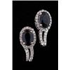 Image 1 : Elegant 14K WG Ladies Hoop Design Earrings set with two oval sapphires weighing approx 0.80 carats a