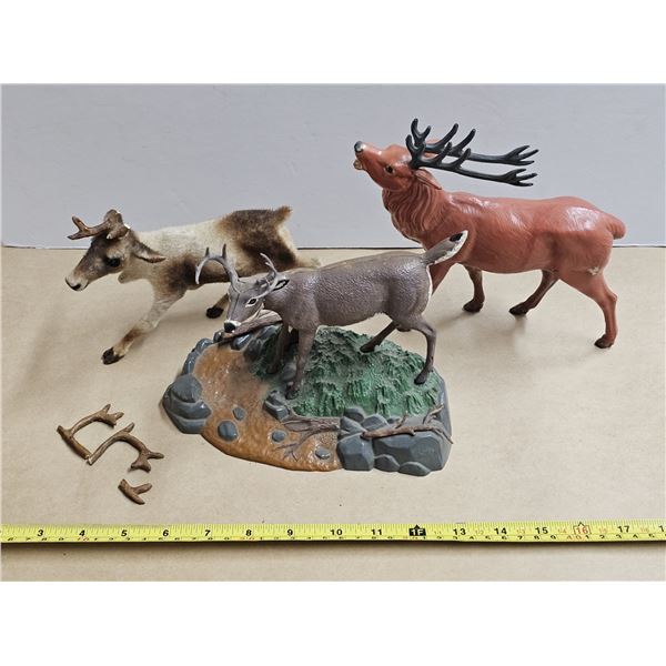 (1) Plastic Deer on Stand, (1) Plastic Reindeer, (1) Fuzzy Reindeer (Broken Antlers)