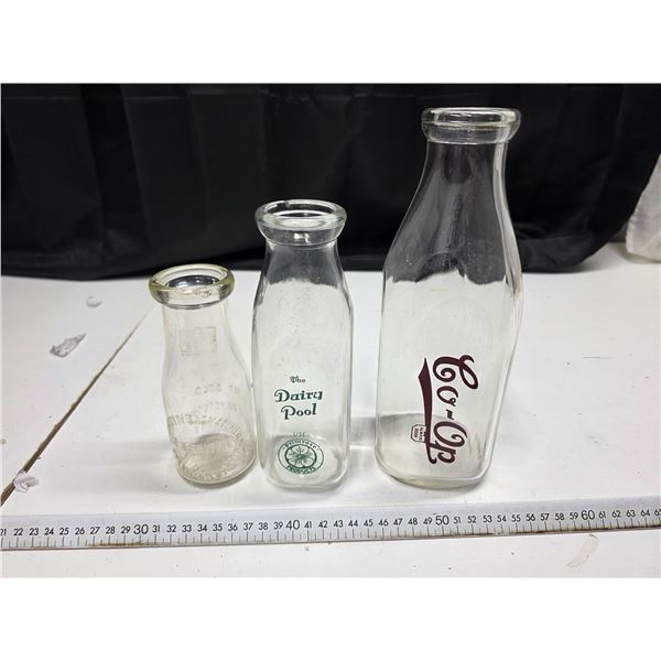 3 Saskatchewan glass milk bottles