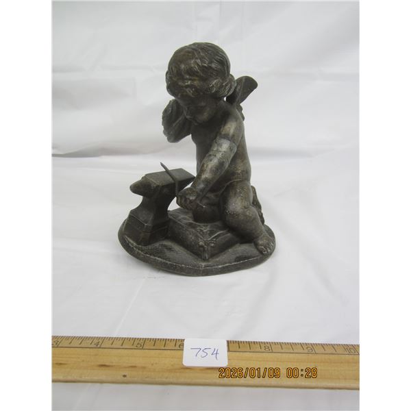 Antique Metal Statue of a Angel Working on a Anvil