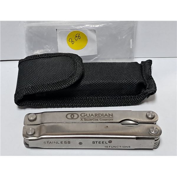 stainless leather man c/w sheath c/w multi tools