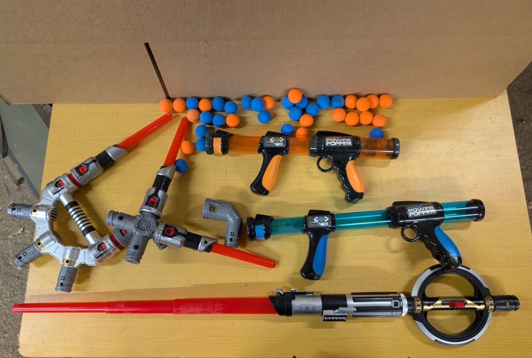 Power popper air gun with starwars light saber toys - Schmalz Auctions