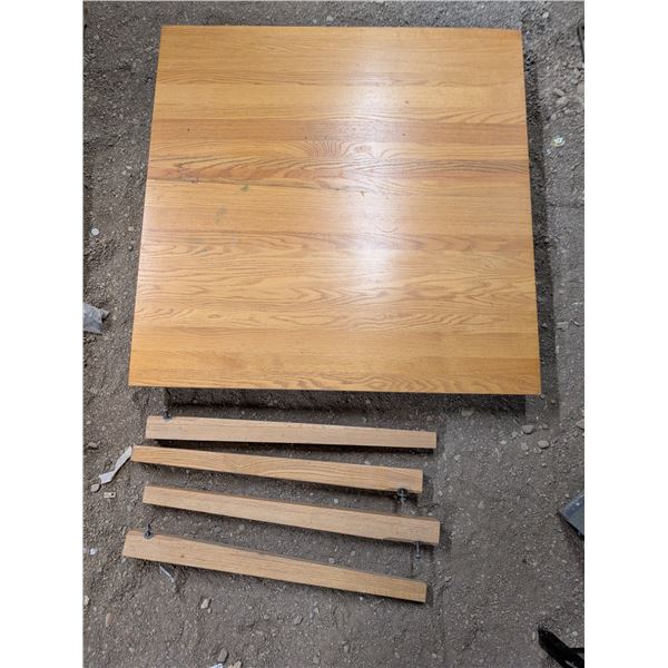 Wooden table with leg that comes off- 41" by 40" by 34"H