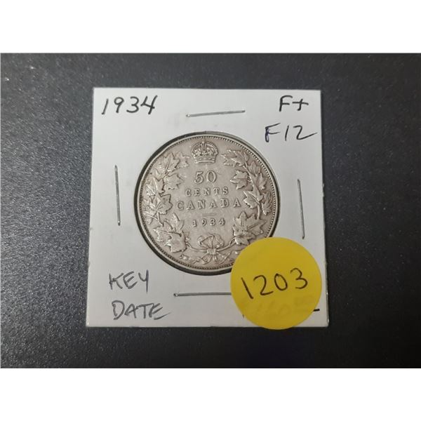 1934 Canadian Silver 50 Cents. Key Date. Mintage of 39,539. F12.