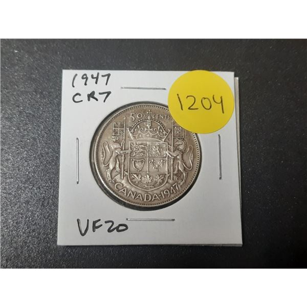 1947 Curved Right 7 Canadian Silver 50 Cents. VF20.