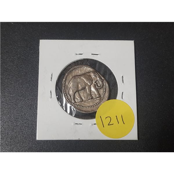 Replica of Greek Tetradrachm coin that depicts an elephant.