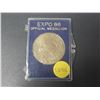 Image 1 : EXPO 86 Official Medallion. Housed in a hard plastic holder.