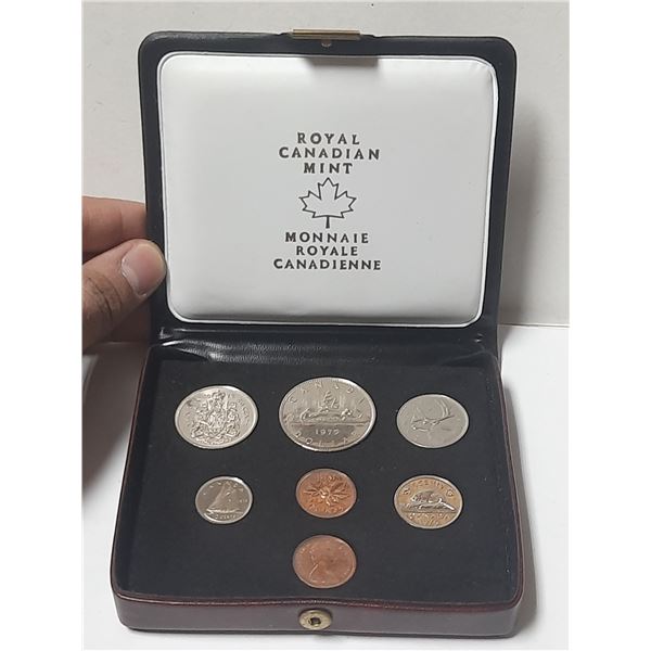 1975 7-coin Nickel Custom Set. Includes two 1 Cent Coins. Housed in its original RCM maroon case wit