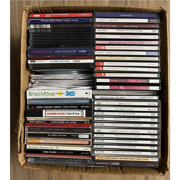 Box of music CDs. Guitar based music.