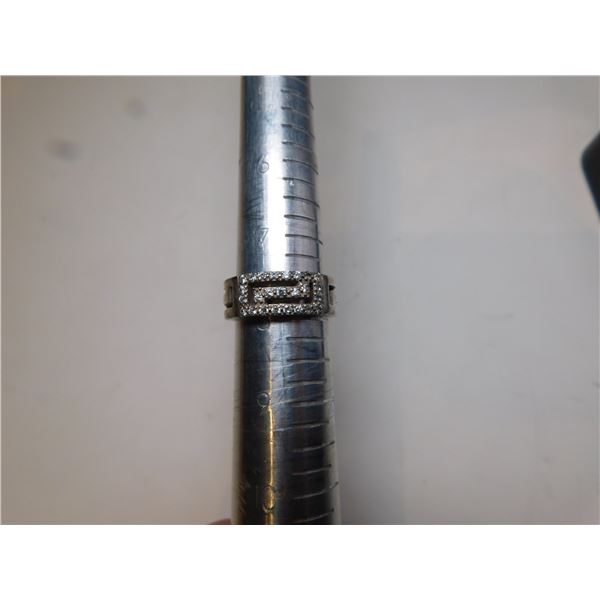 SIZE 8 STERLING RING LOTS OF SPARKLES, WITH CROWN SYMBOL IN BAND