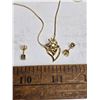 Image 2 : Necklace and earrings- gold colored