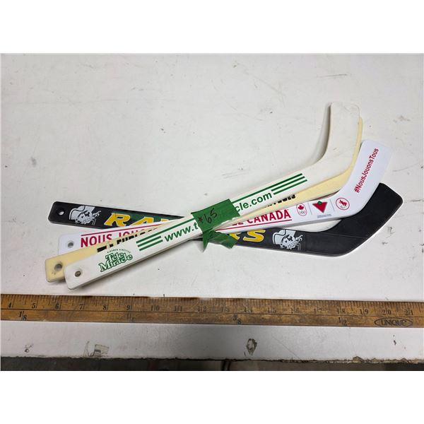 4 mini hockey sticks