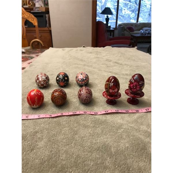288: Four real Ukrainian Easter eggs + 4 wooden ones + 2 wooden stands. One real egg has the Lord's 