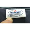 Image 2 : 296: Large medical firm pillow for elevating legs with zippered cover that comes off for cleaning.