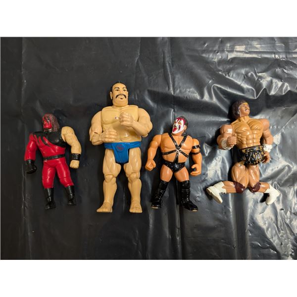 4 wrestling figures