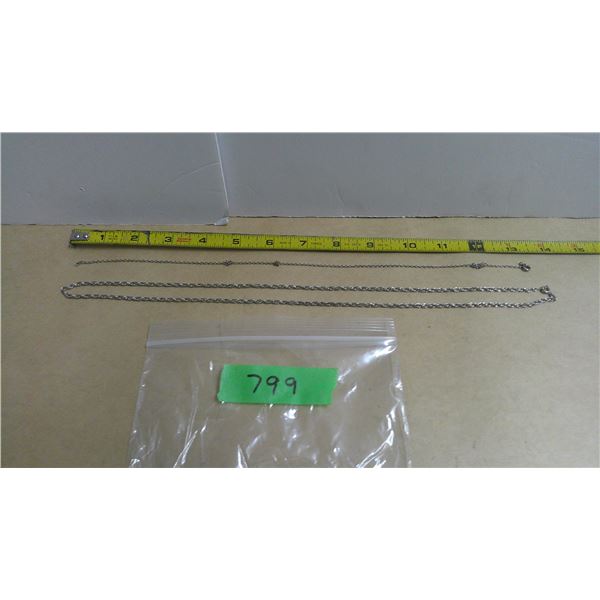 (2) silver colored necklaces
