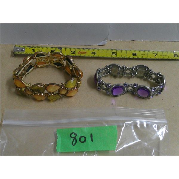 (2) purple + yellow bracelets