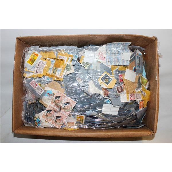 ESTATE BOX OF CANADIAN+WORLD STAMPS ON PAPER