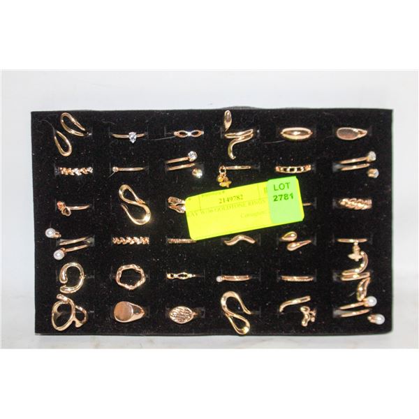 TRAY W/36 GOLDTONE RINGS